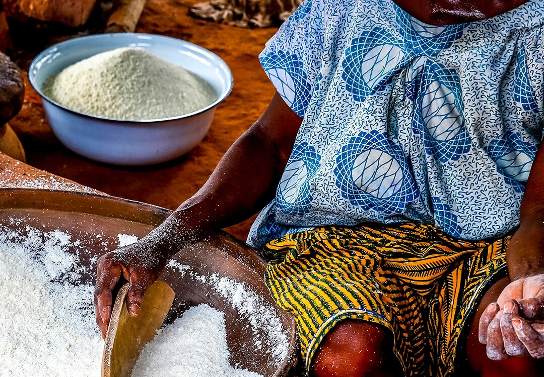 Processing cassava into flour on the outskirts of LomÃ©, Togo.