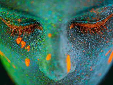 Shot of a young  woman posing with neon paint on her facehttp://195.154.178.81/DATA/shoots/ic_784268.jpg