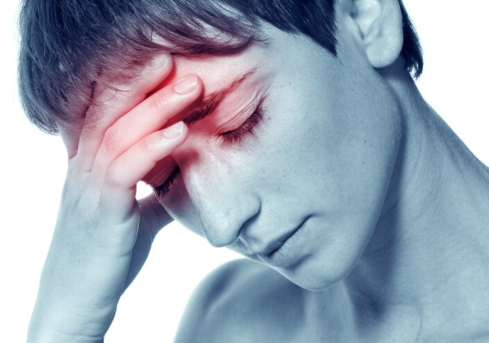 The young attractive woman with an awful migraine. A headache attack